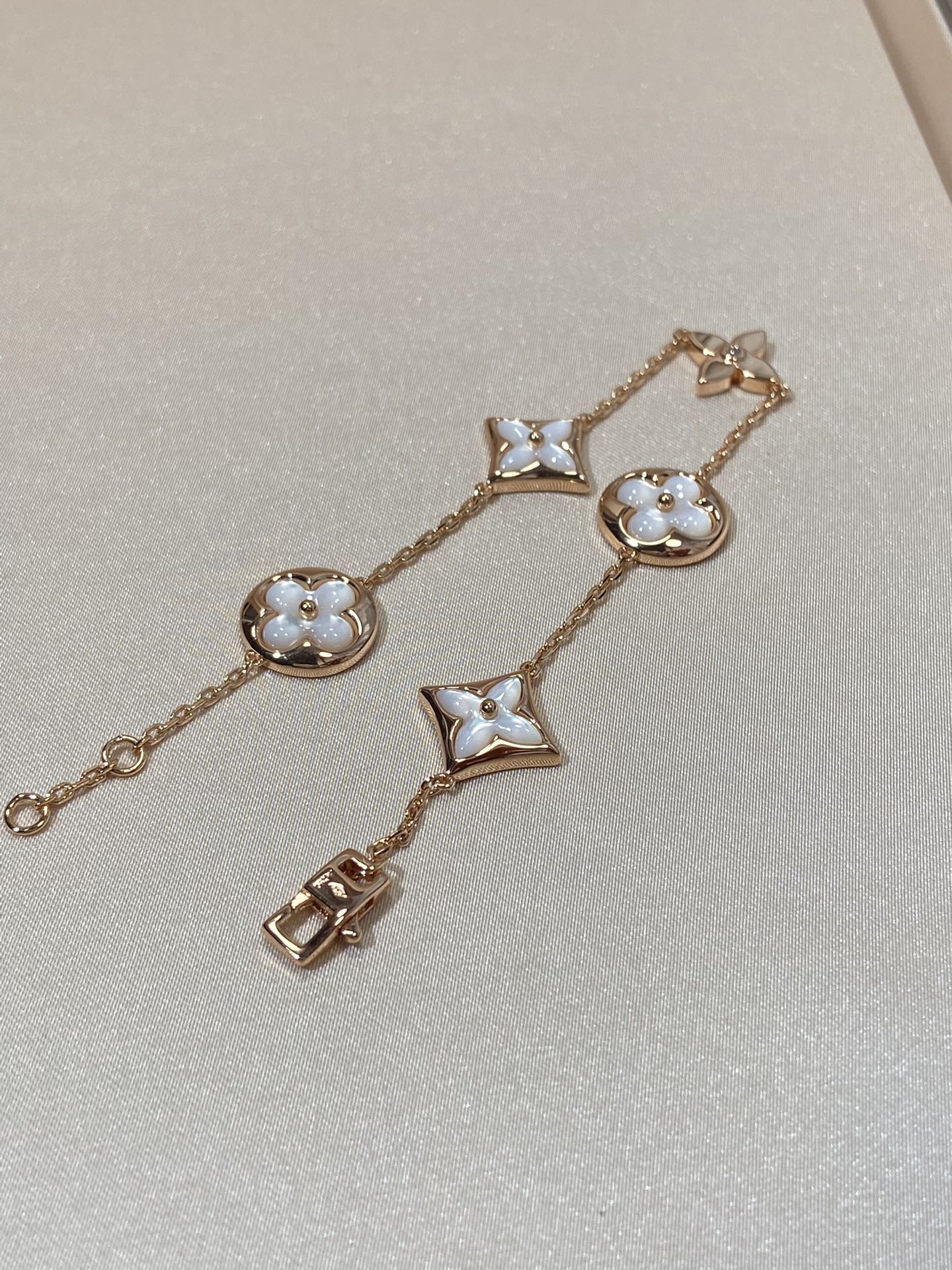 [BLUE TEARS]STAR AND SUN 5 MOTIF MOP PINK GOLD BRACELET