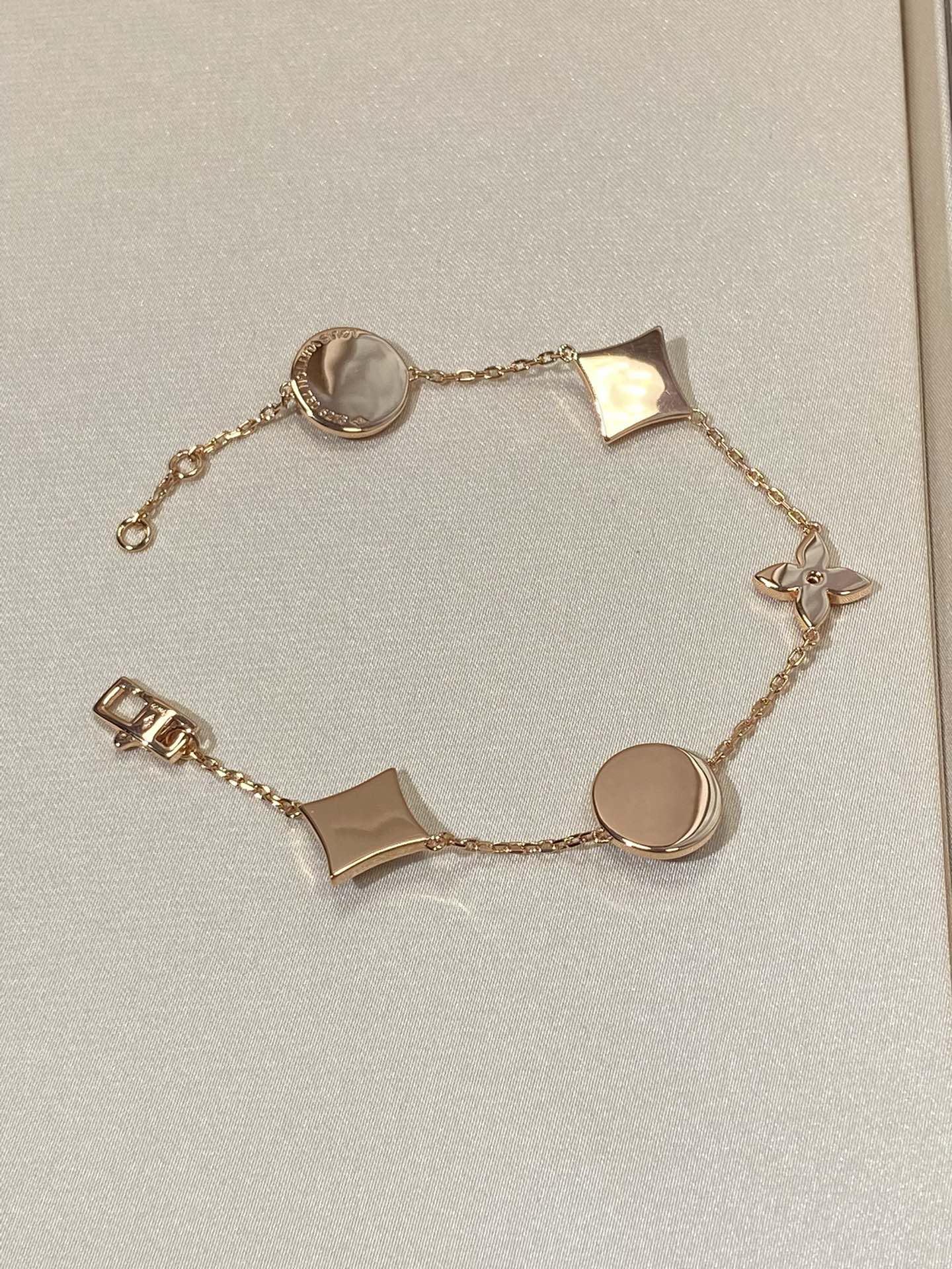 [BLUE TEARS]STAR AND SUN 5 MOTIF MOP PINK GOLD BRACELET