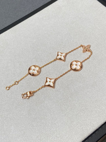 [BLUE TEARS]STAR AND SUN 5 MOTIF MOP PINK GOLD BRACELET