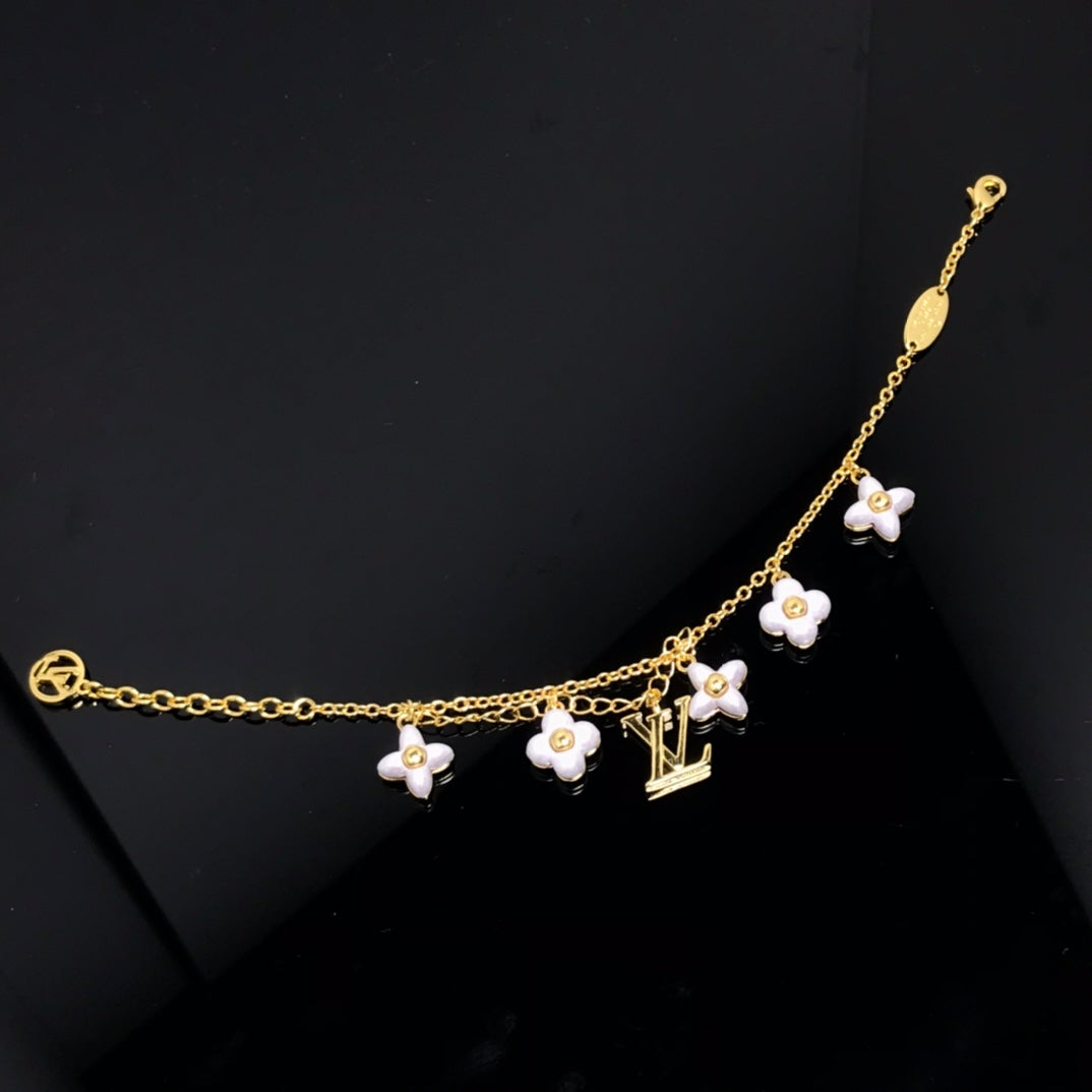[BLUE TEARS]LOGO 6 MOTIF STAR AND SUN GOLD BRACELET