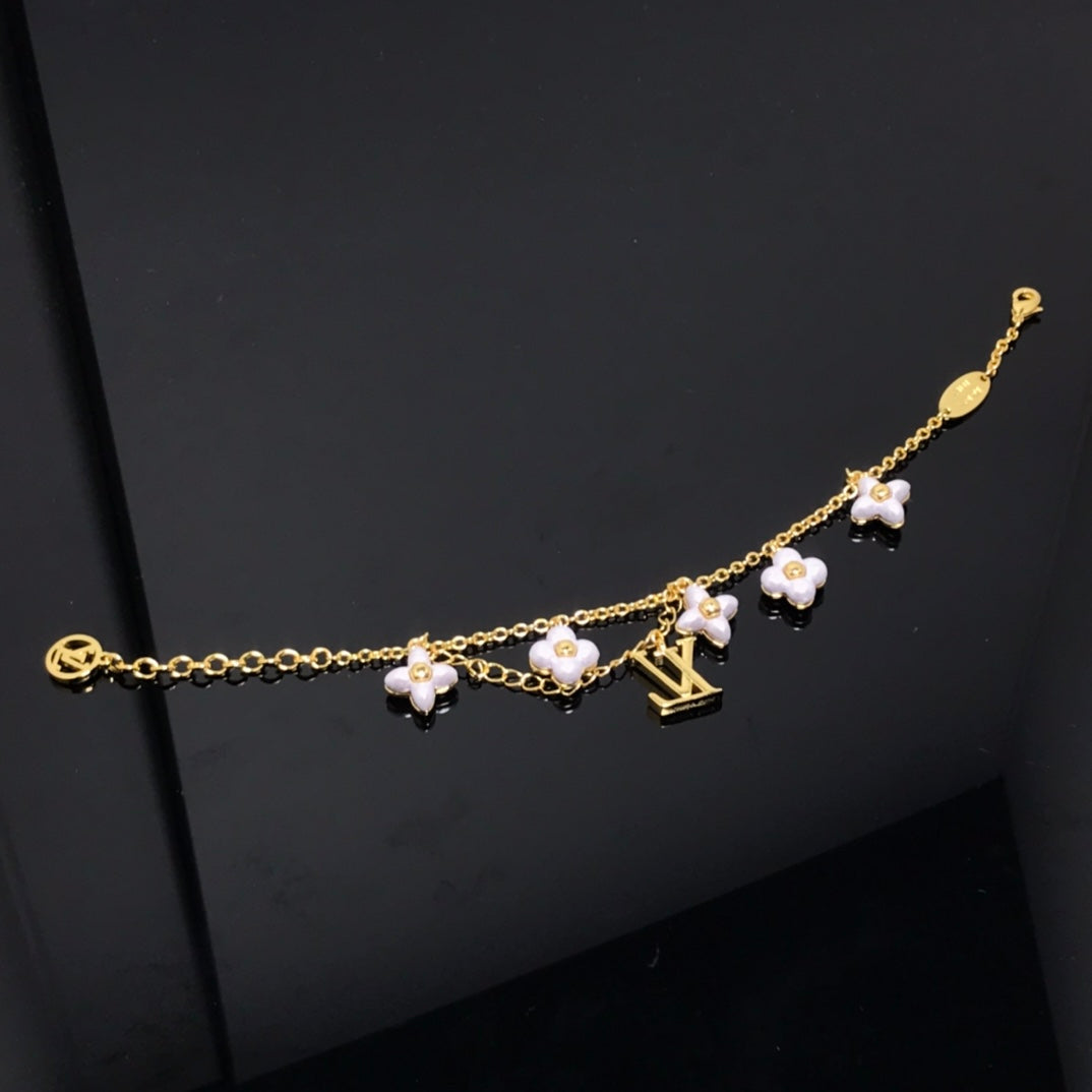 [BLUE TEARS]LOGO 6 MOTIF STAR AND SUN GOLD BRACELET